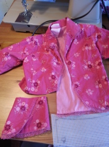 It started as a size 2T adorable fine corduroy jacket with a matched lining already attached.